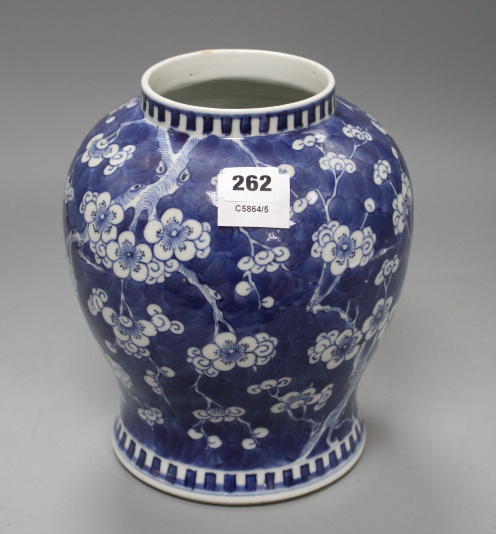 A Chinese blue and white prunus pattern baluster vase, height 25cm